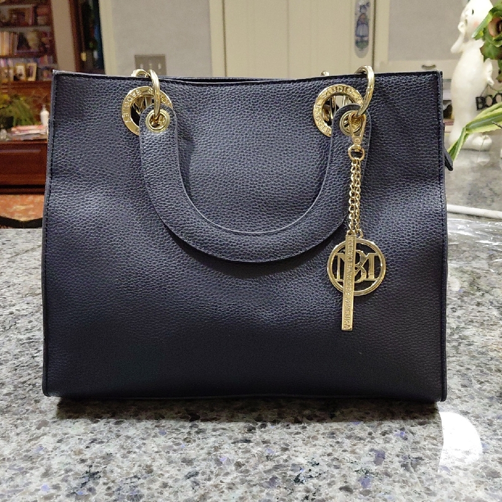 "Studio by Mischka Bagdley" Chic Navy Tote with Gold Detailing.